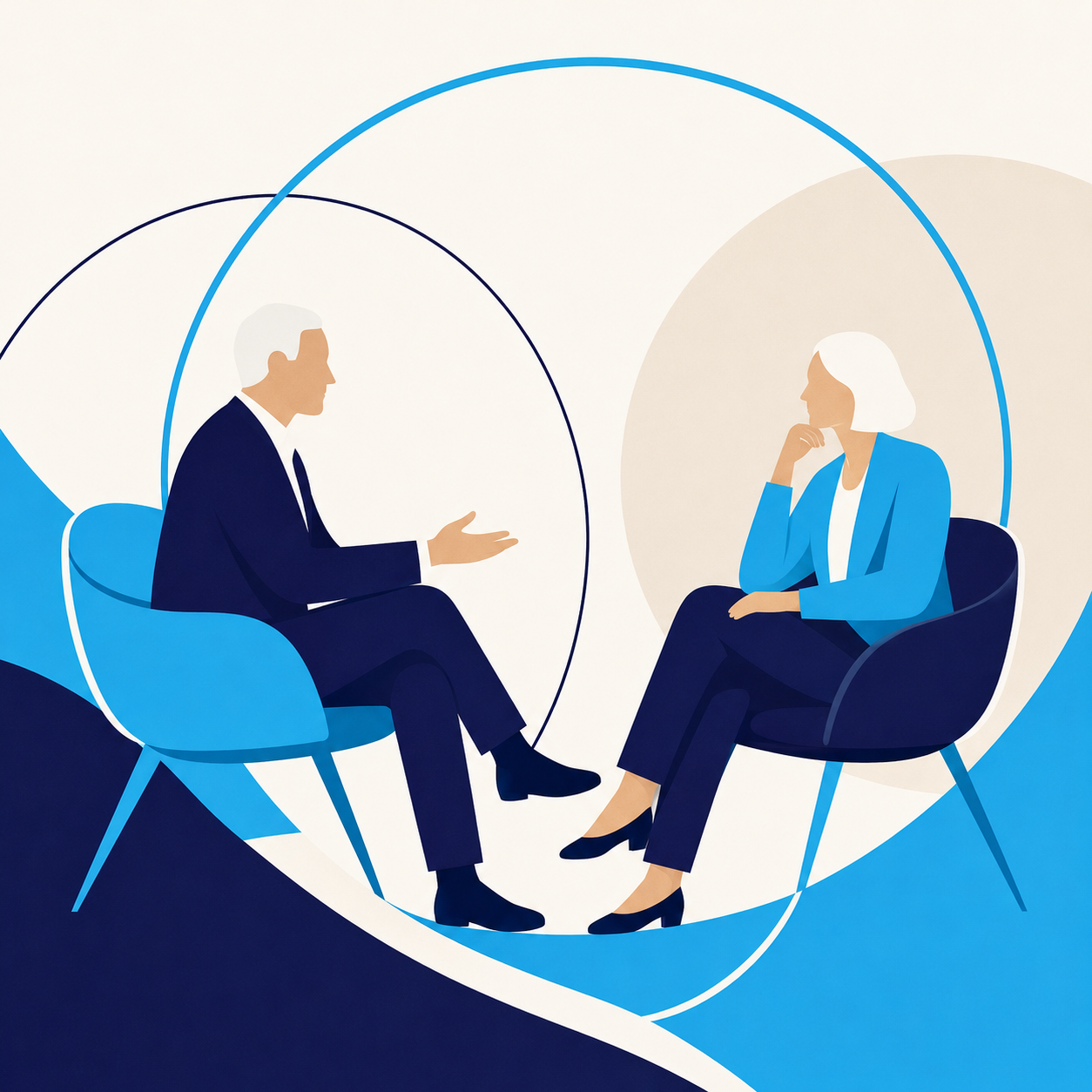 Two senior leaders in a focused one-to-one leadership coaching conversation